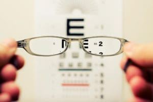 new eyeglass and eye test chart at the back