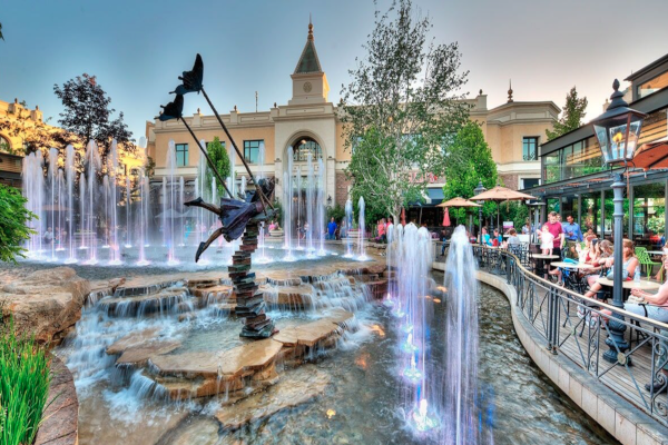 A fountain in the middle of a town square locations.