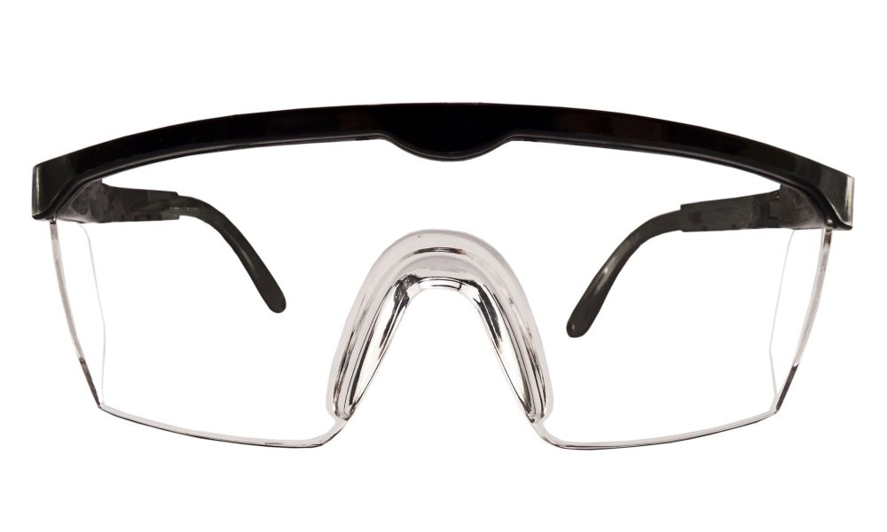 A pair of clear safety glasses to protect your vision, on a white background.